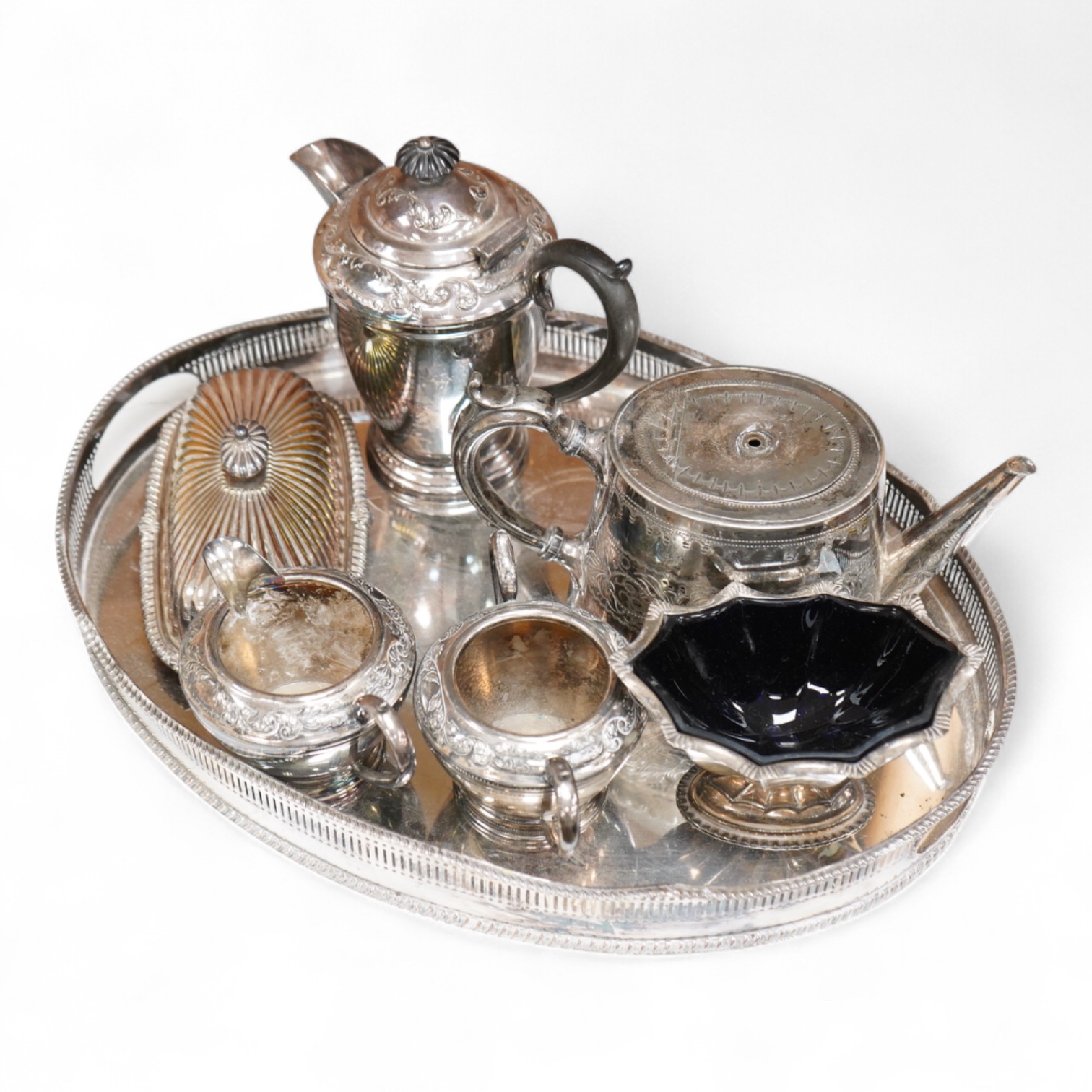 A quantity of plated wares to include a galleried tray, teapot, jug and bon bon dish with glass liner, largest 45cm wide